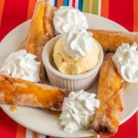 Banana Flautas · Bananas rolled in a crispy flour tortilla with cinnamon and sugar. Served with vanilla ice c...
