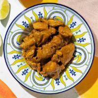 Curry Chicken · Chicken thigh and leg marinated in our famous family curry sauce.