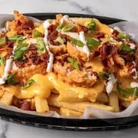 Nutty Fries · Crispy fries topped with melted cheese, bacon, ranch, scallions and fried chicken.