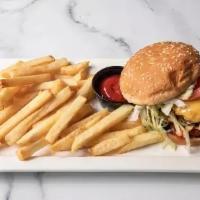 Nutty Deluxe Cheeseburger · Angus beef burger topped with American cheese, potato sticks lettuce, tomatoes,  onions, and...