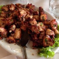 Octopus In Garlic Sauce · saute slices of octopus in olive oil and garlic