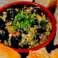 Marinated Olives  · Marinated Portuguese olives served with toasted bread