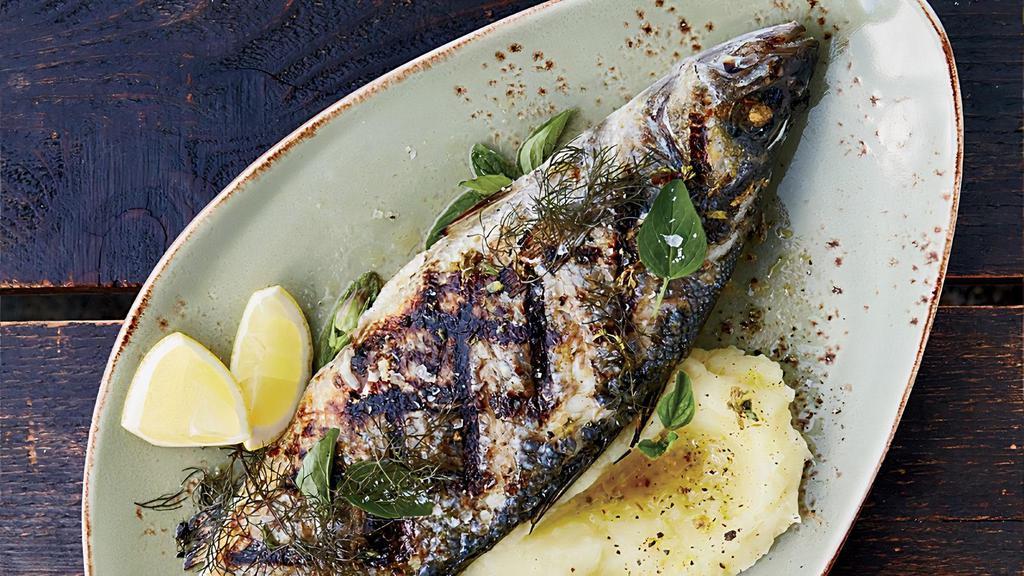 Grilled Bronzini  · Grilled Mediterranean sea bass served with vegetables and boiled potatoes