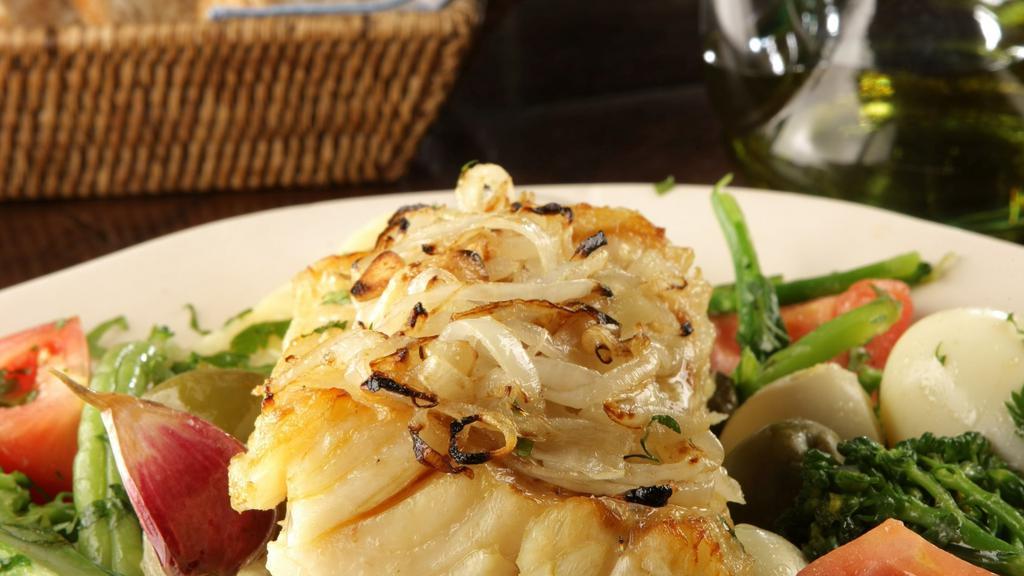 Grilled Cod Fish · served with potatoes and vegetables