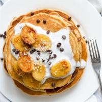 Banana Pancakes · Delicious, hot buttermilk pancakes cooked to perfection. Topped with fresh banana slices.