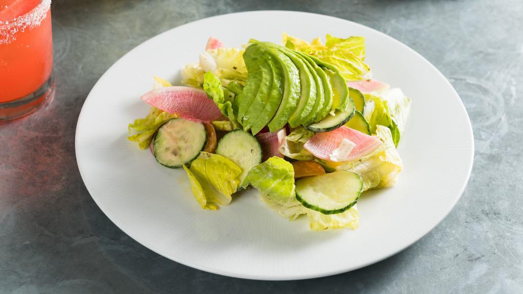 House Salad With Avocado  · Romaine lettuce, avocado, and radishes with herb vinaigrette.