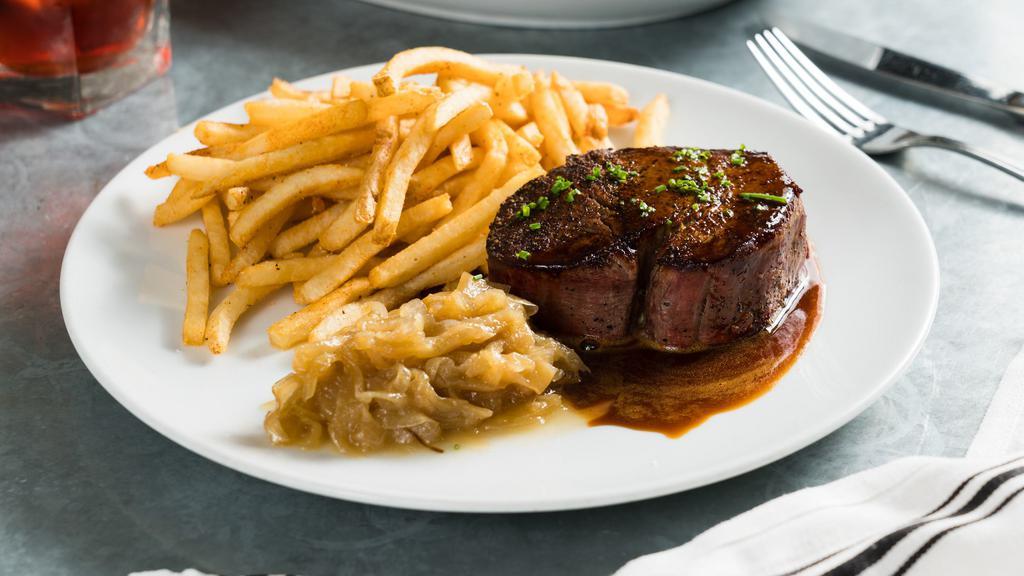 Ny Strip · Fried onions and french fries.