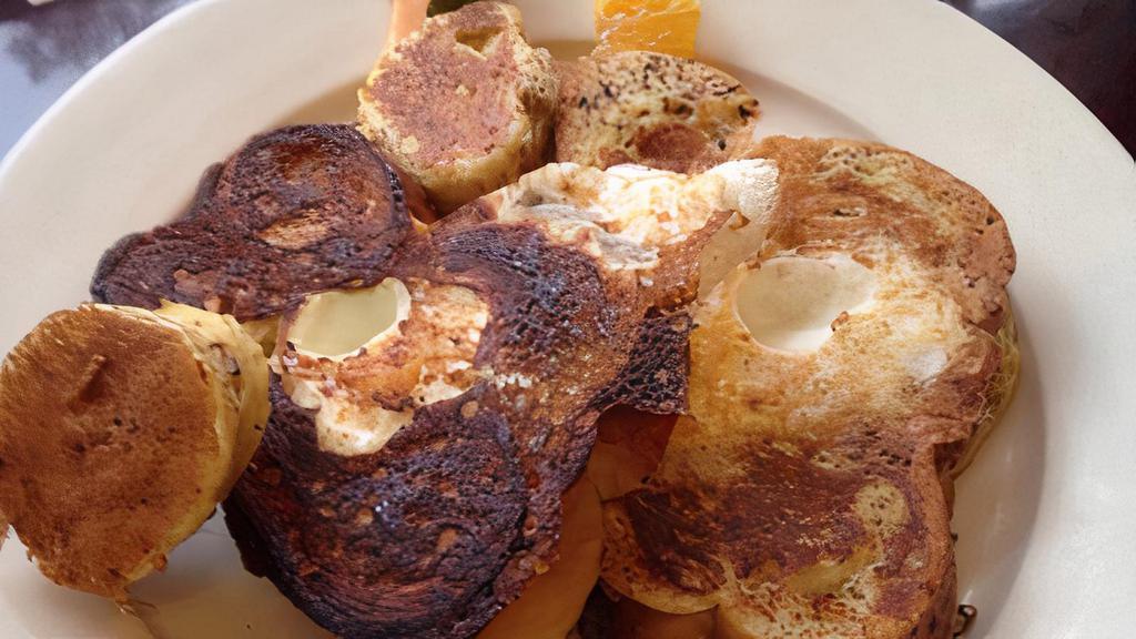 Jack'S Speciality Moonstruck · Two eggs served in French toast with fresh fruit.