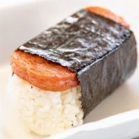 Musubi · Spam or fried hot dog on top of white rice, wrapped with nori.