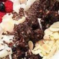Yum Yum Yogurt Bowl · Acai bowl topped with  greek yogurt, granola, bananas, strawberries, blueberries, and honey.