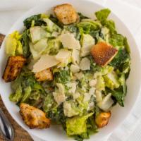 Caesar Salad · Crisp romaine with homemade Caesar dressing, homemade croutons and shaved parmigiana Reggiano