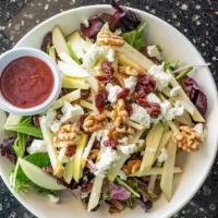 The Godmother Salad · Spring mix with goat cheese, walnuts cranberries pears & apples with a raspberry dressing.