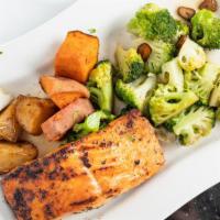 Grilled Salmon · Served with sauteed broccoli, sweet & roasted potatoes.