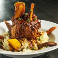 Braised Riverbeast · Pork shank, mashed potato, tri-color carrot, rosemary jus, parsley. Gluten Free