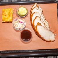 Smoked Turkey Platter · Smoked, all white meat turkey breast. Served with coleslaw, pickles, onions, cornbread and a...