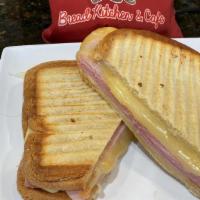 Tosta Mista Pao De Forma · Texas Slice with ham and cheese,panini pressed.