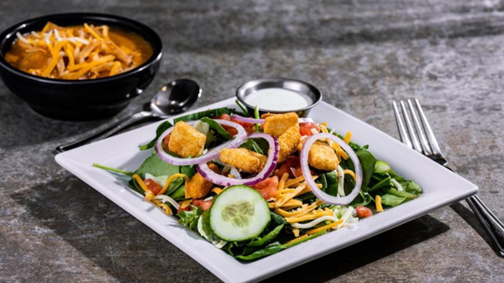 Soup & House Salad · A delicious bowl of Soup with a House Salad. Dressing served on the side.