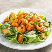 Shrimp Caesar Salad · Shrimp, crisp Romaine, Parmesan cheese, garlic croutons with Caesar dressing.