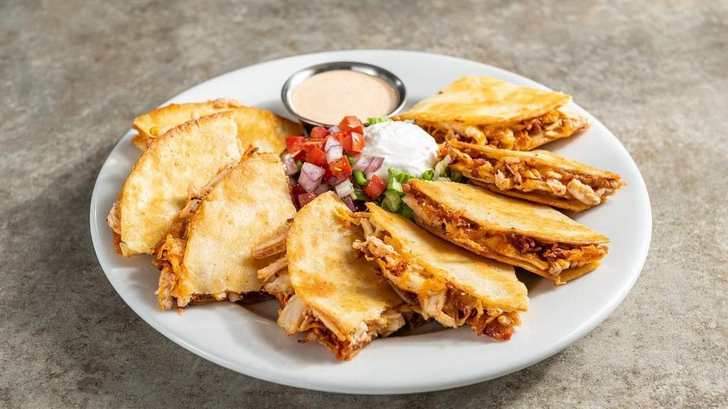 Bacon Ranch Chicken Quesadillas · Chicken, shredded cheese, chile spices, bacon, house-made ranch. Served with pico, sour cream, ancho-chile ranch.