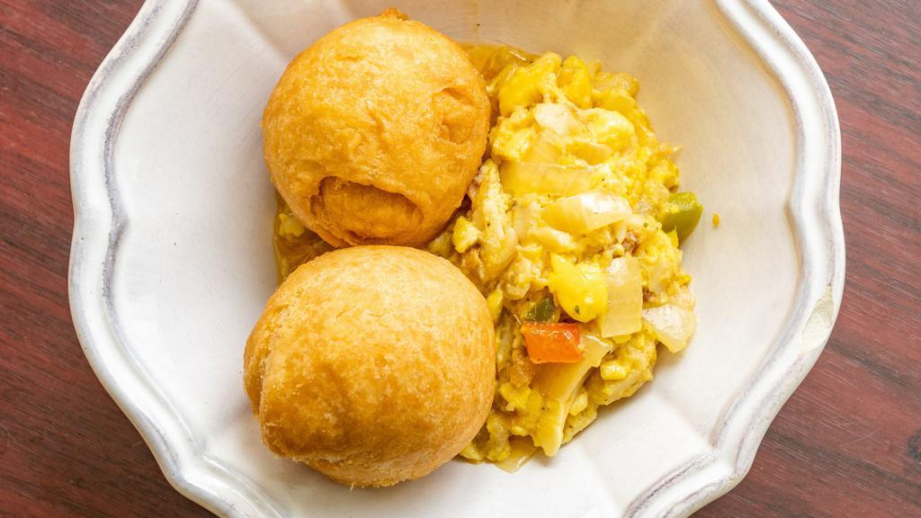 Ackee And Saltfish · Served with boiled or fried dumplings, yam, and banana.