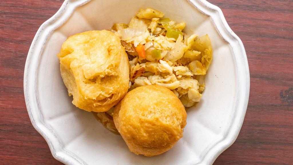 Cook Up Saltfish · Served with boiled or fried dumplings, yam, and banana.