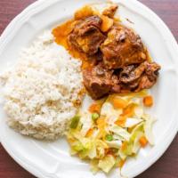 Stew Chicken · Served with white rice or peas and vegetables.