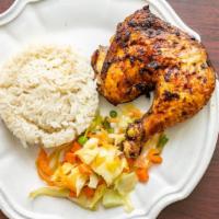 Jerk Chicken · Served with white rice or peas and vegetables.
