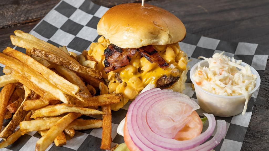 The Mac Attack · Beef burger topped w/ chopped bacon &
classic mac & cheese.