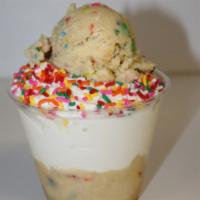 Birthday Cake Doughnado · Confetti Cookie Dough layered between soft serve ice cream topped with Rainbow Sprinkles!