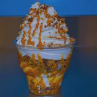 Peanut Butter Crunch · Vanilla ice cream with peanut butter sauce, peanut butter cups and chocolate crunch topped w...