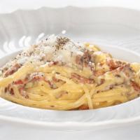 Carbonara* · spaghetti Setaro, organic egg, guanciale, Pecorino Romano DOP,  Tellicherry black pepper.  *...