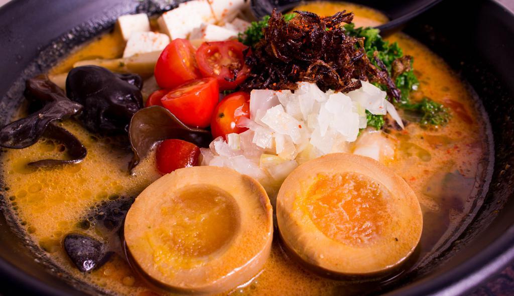 Vegetarian Miso · Tofu, egg, kale, kikurage, tomato, bean sprouts, onion, nori seaweed, bamboo, roasted onion flakes, chili oil.