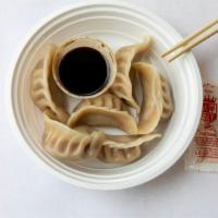 Steamed Dumplings (6) · CONTAINS MSG.