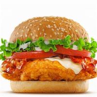 Bacon Ranch Chicken Sandwich · 6 oz fried chicken breast, cheddar cheese, bacon, lettuce, tomato, and ranch dressing on a b...
