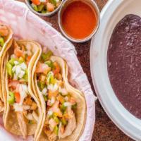 Taco Plate · Favorite. Corn tortillas stuffed with either chicken or steak. Served with pico de gallo and...