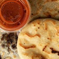 World Famous Pupusas · Favorite. Tortilla-like flatbread stuffed with either pork and cheese, bean and cheese or ju...