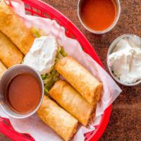 Taquitos · 3 pieces. Fried rolled tortillas stuffed with beef and cheese or chicken and cheese. Served ...