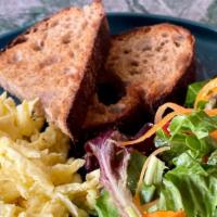 The Egg Plate · 3 soft scrambled eggs, baby greens and multigrain toast