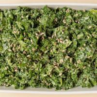 Tahini Kale Salad · Curly kale, tahini dressing, sunflower seeds.