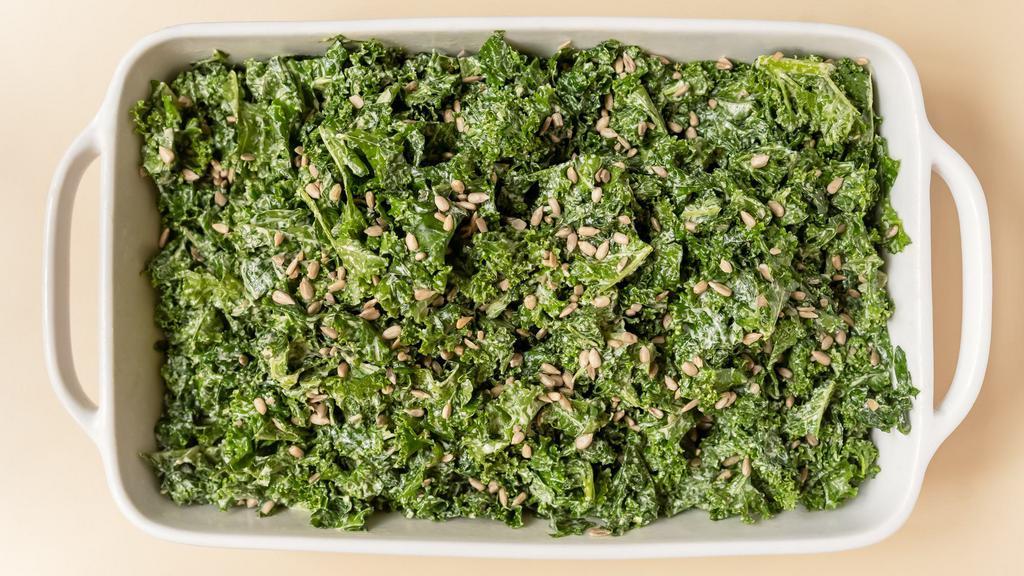 Tahini Kale Salad · Curly kale, tahini dressing, sunflower seeds.