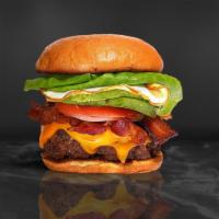 Early Riser Burger · American beef patty topped with bacon, fried egg, avocado, melted cheese, lettuce, tomato, o...