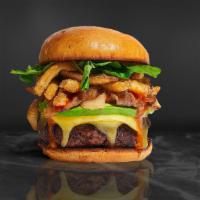 Frenchy Fry Burger · American beef patty topped with fries, avocado, caramelized onions, ketchup, lettuce, tomato...