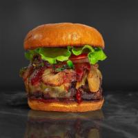 Blessed Bbq Burger · American beef patty topped with melted cheese, barbecue sauce, lettuce, tomato, onion, and p...