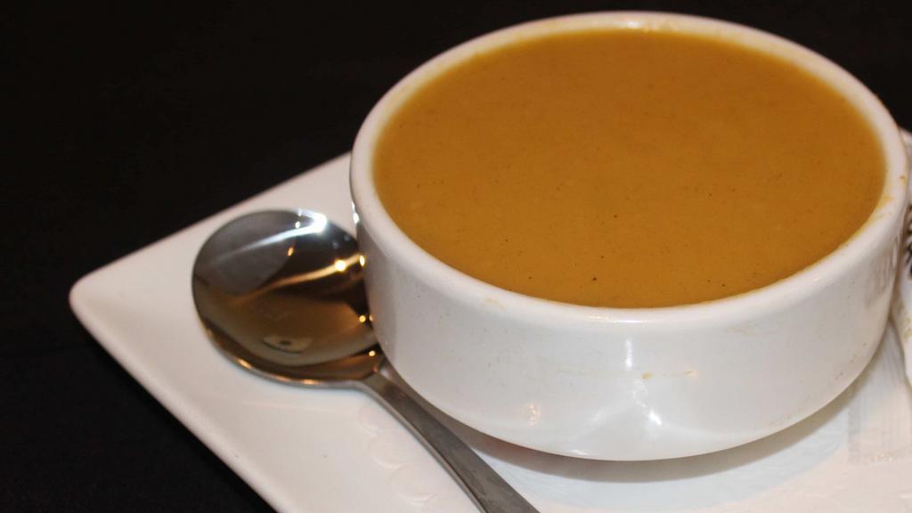Organic Butternut Squash Soup · Our delicious organic roasted butternut squash in a creamy blend of carrots, celery, tomato and garlic with turmeric, cumin and curry spices.