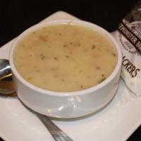 New England Clam Chowder · Classic New England style chowder filled with tender chopped clams, potatoes, onions, fresh ...