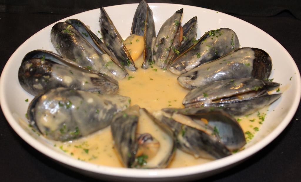 Steamed Mussels And Littlenecks · Cape cod mussels and Chesapeake Littlenecks steamed in  a house made garlic white wine sauce