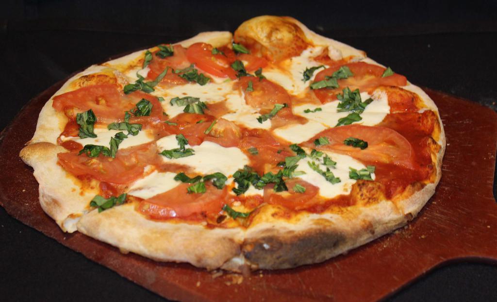 Margherita Pizza · Fresh local Mozzarella cheese, fresh tomato, fresh basil.