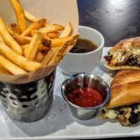 French Dip · Certified Angus Beef® roast beef, American cheese, mushrooms, onions, housemade au jus, toas...