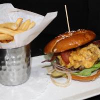 Mac And Cheese Burger · Bacon, macaroni and cheese, bibb lettuce, tomato, pickles, red onion, chipotle aioli, soft p...
