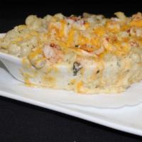 Lobster Mac And Cheese · Lobster meat, freshly-made cavatappi, mushrooms, onions, housemade alfredo sauce, mozzarella...